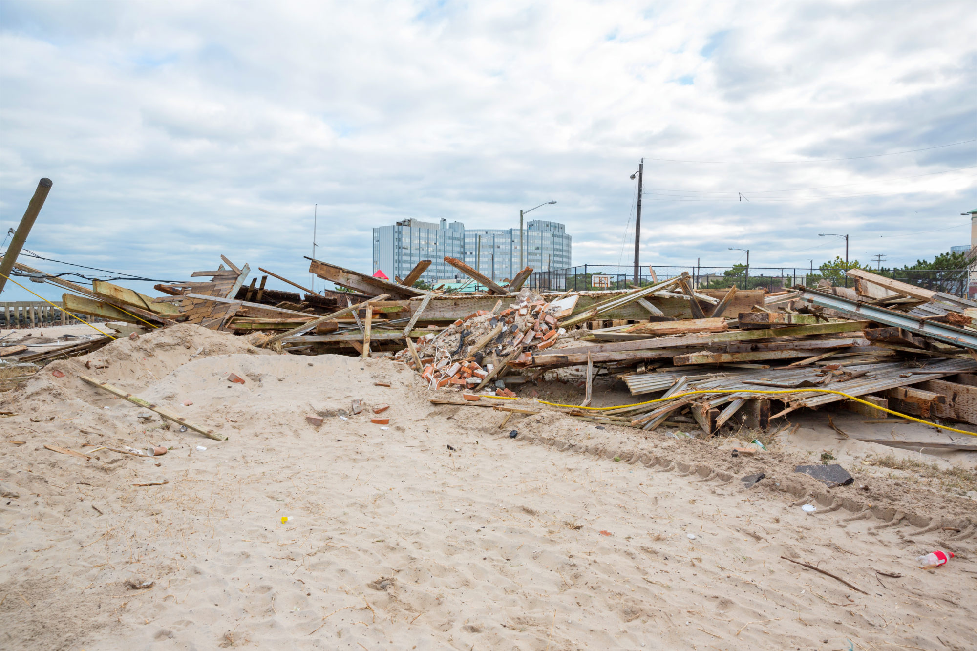 beach covered with debris after Hurricane Sally