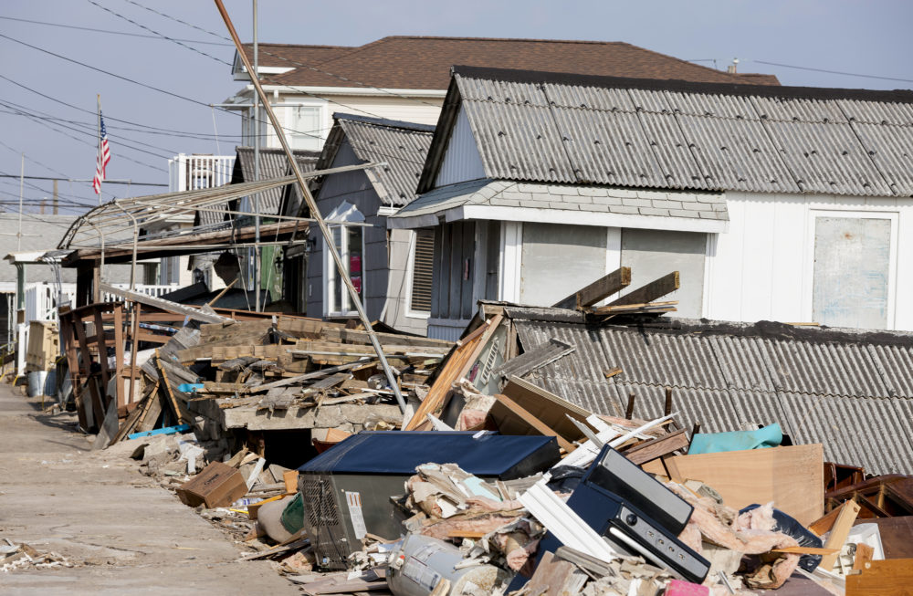 debris set out in front of homes after the Hurricane Delta clean-up